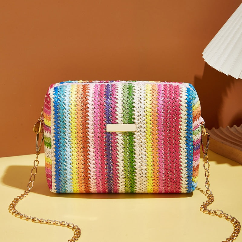 Small multicolor rattan handbag with bold color bands