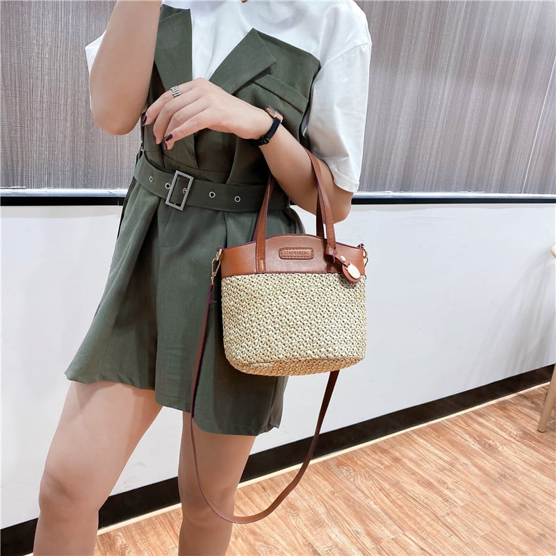 Straw handbag with soft faux leather trim – worn by a model (3)