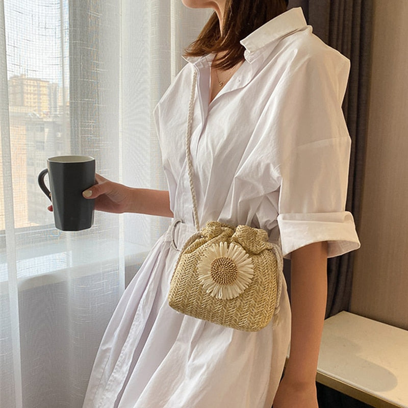 Everyday woven rattan purse – worn by a model
