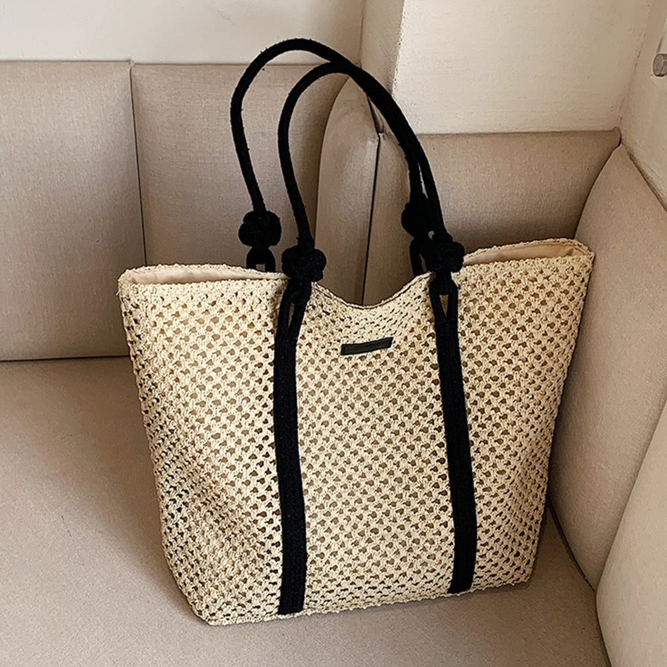 Woven straw handbag with handles