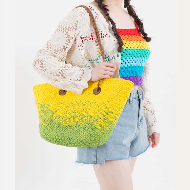 Yellow and green woven straw tote