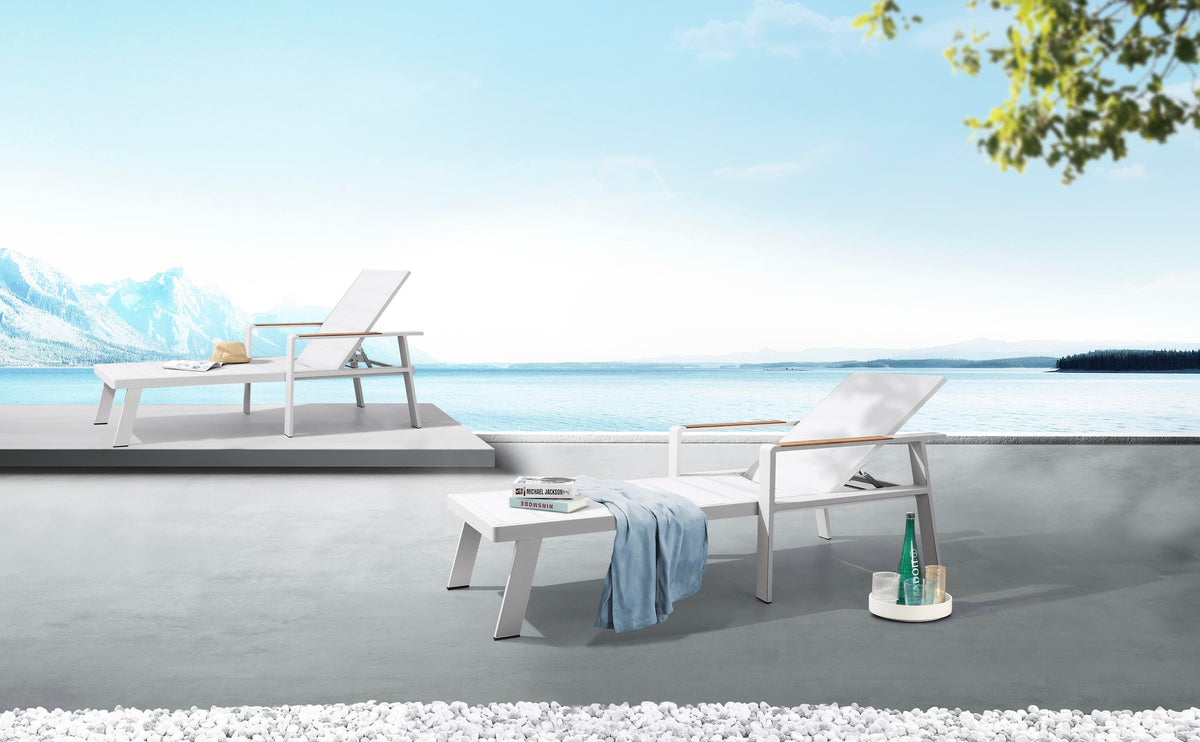 Noffy beige textilene chaise lounge with teak armrests – shown outdoors (3)
