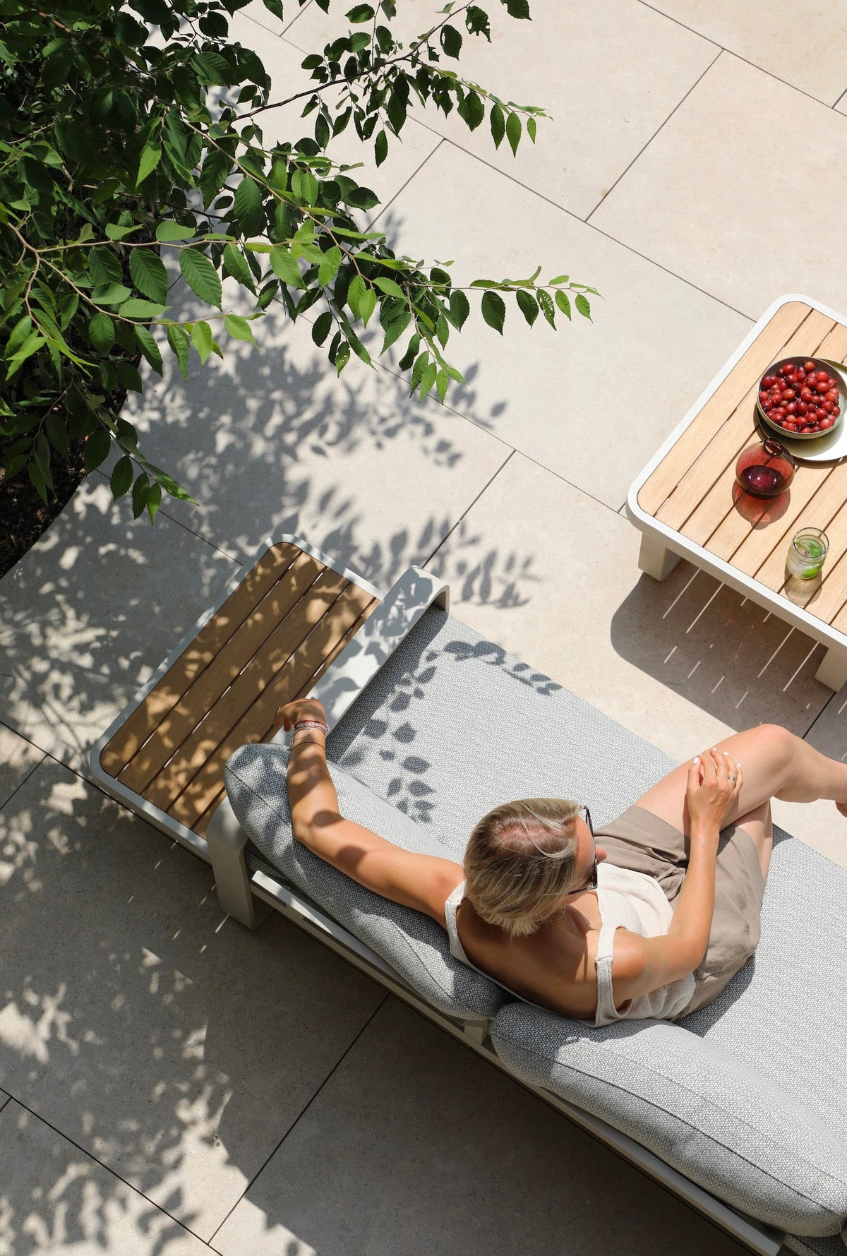Emilia beige aluminum and teak modular outdoor sectional – shown outdoors (4)