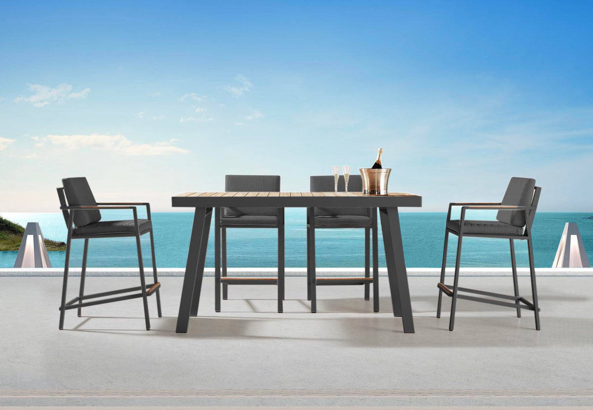 Noffy black aluminum and teak bar-height patio set – shown outdoors (3)