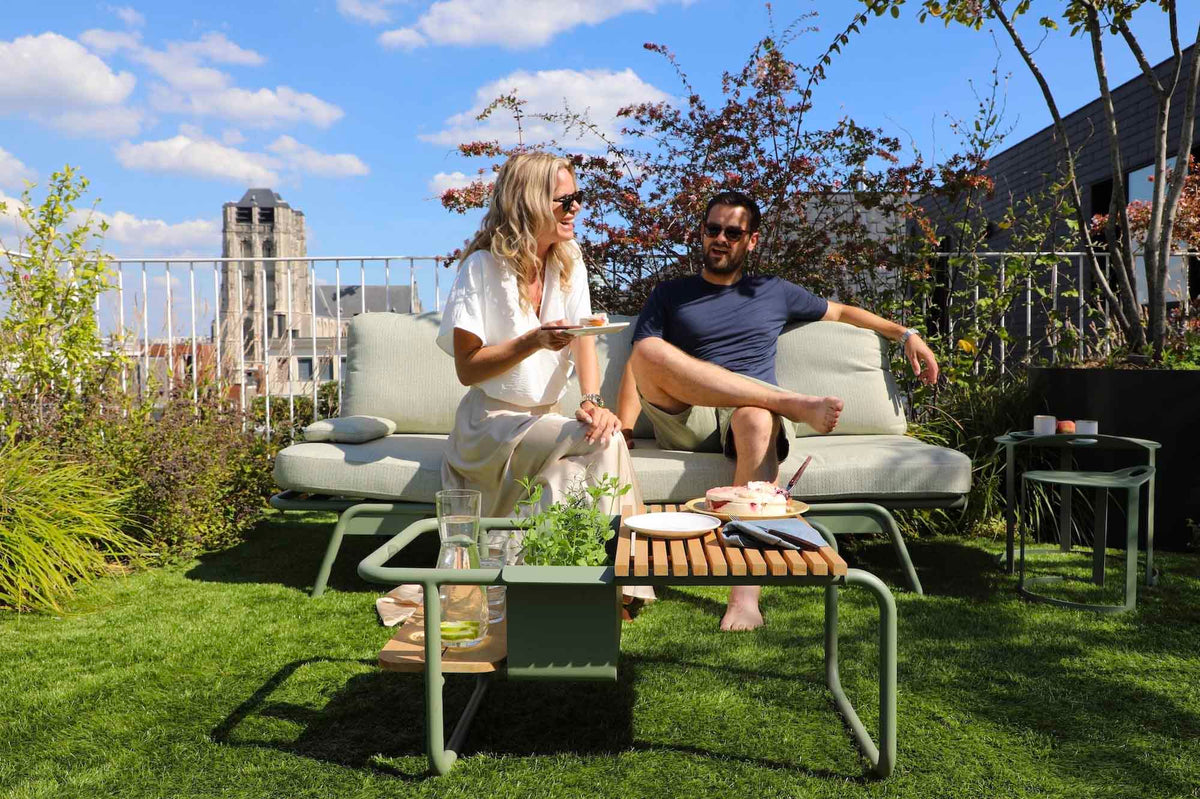 Sunny green convertible aluminum outdoor sofa lounger – shown outdoors (5)