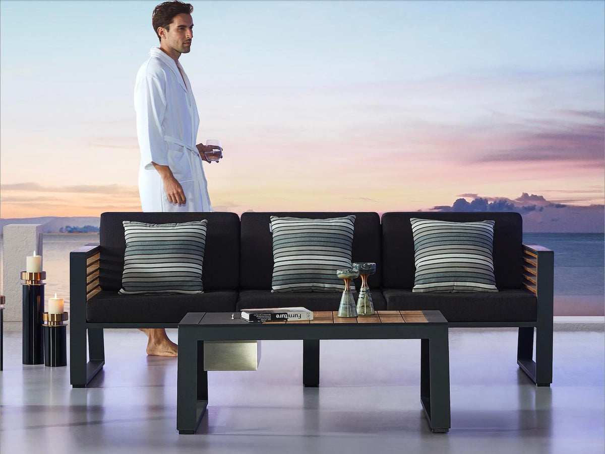Cofy 3-seat aluminum and teak outdoor sofa – shown outdoors (4)