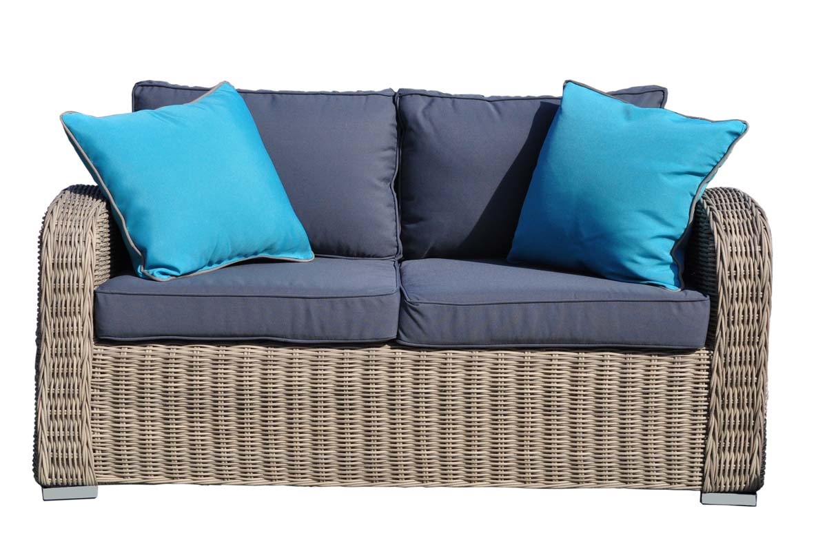Tara resin wicker loveseat patio set with dark gray cushions and glass table