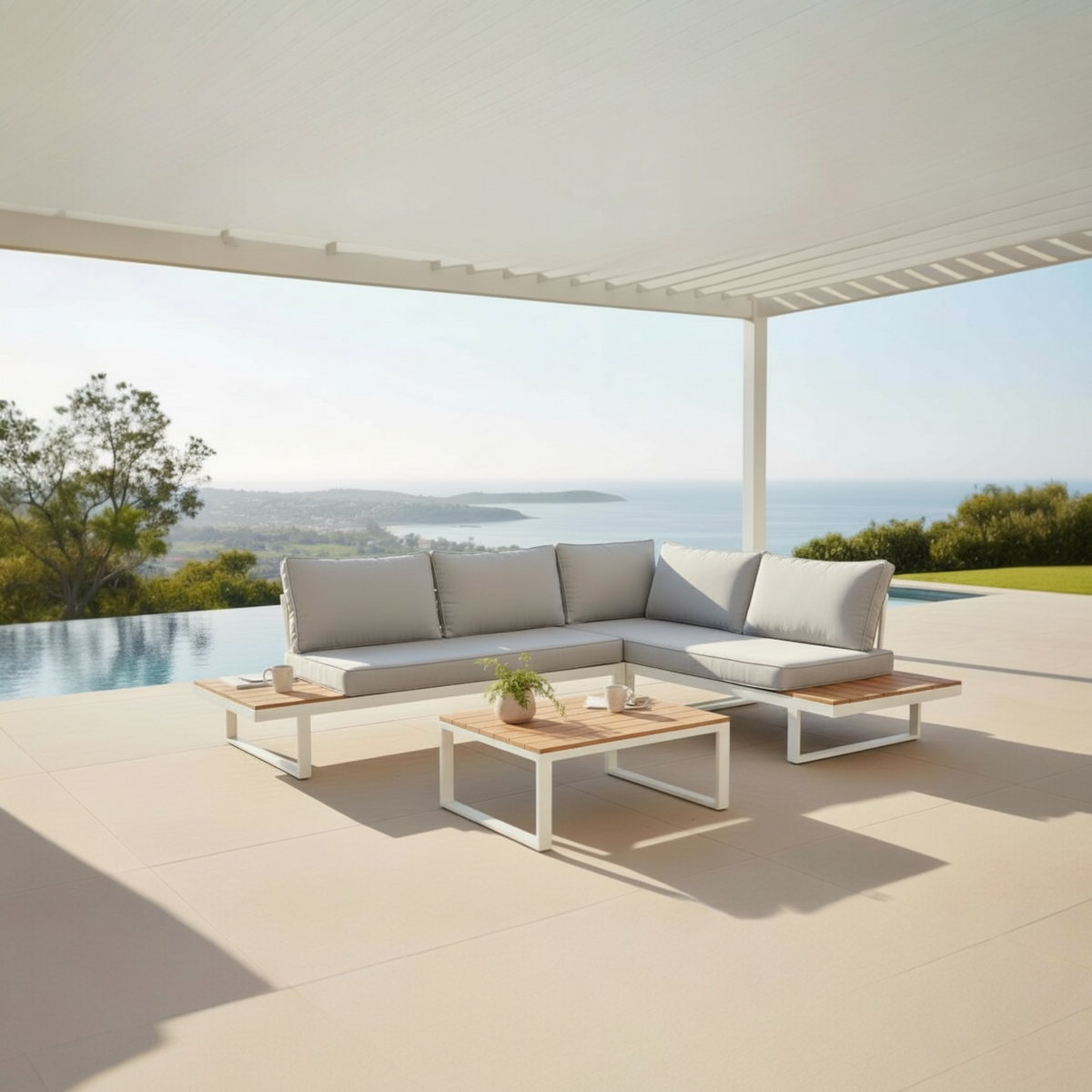 Stacy white aluminum corner outdoor sofa with light gray cushions – shown outdoors