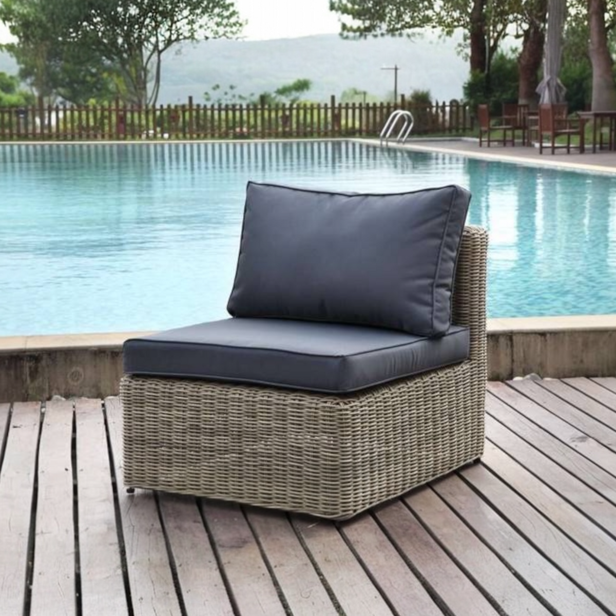 Liberty round resin wicker armless chair – shown outdoors