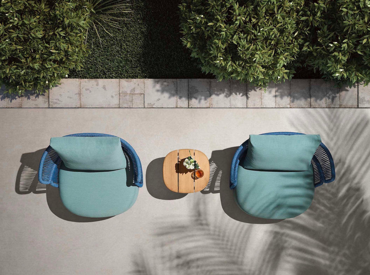 Laska blue rope outdoor armchairs with teak side table – shown outdoors (4)