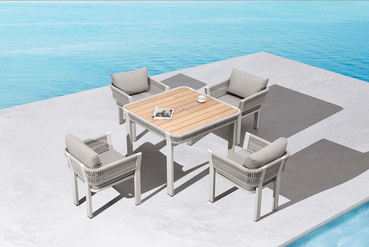 Olby 4-person rope outdoor dining set with umbrella hole – shown outdoors (4)