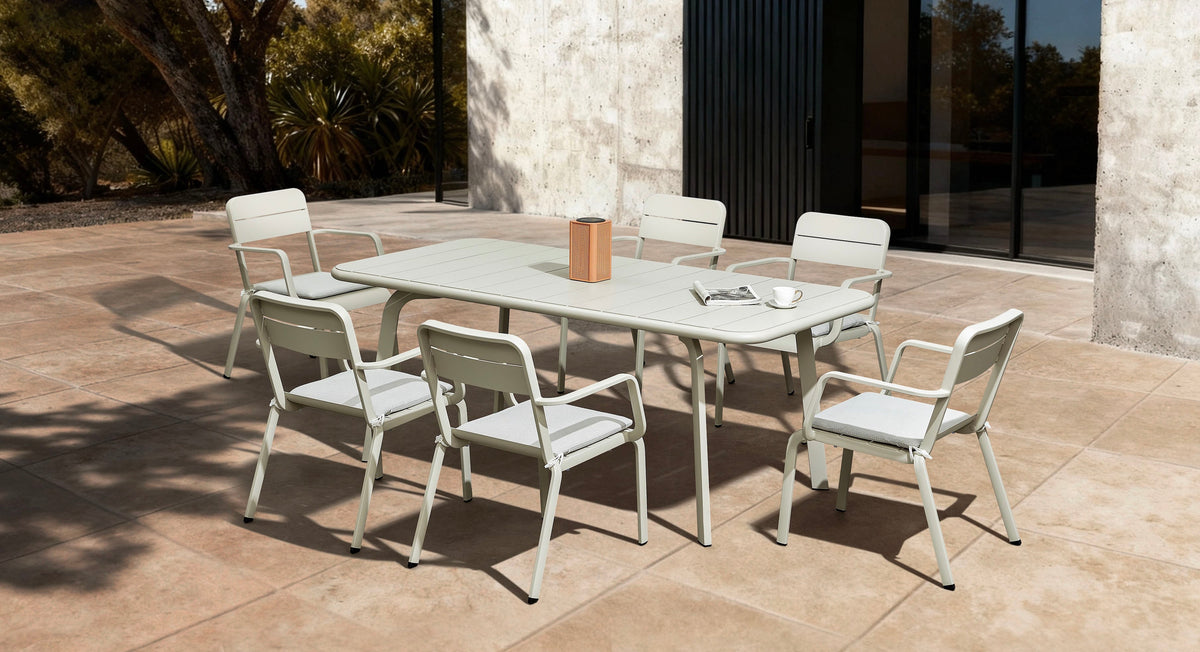 Joy 6-person aluminum outdoor dining set in beige – shown outdoors (2)