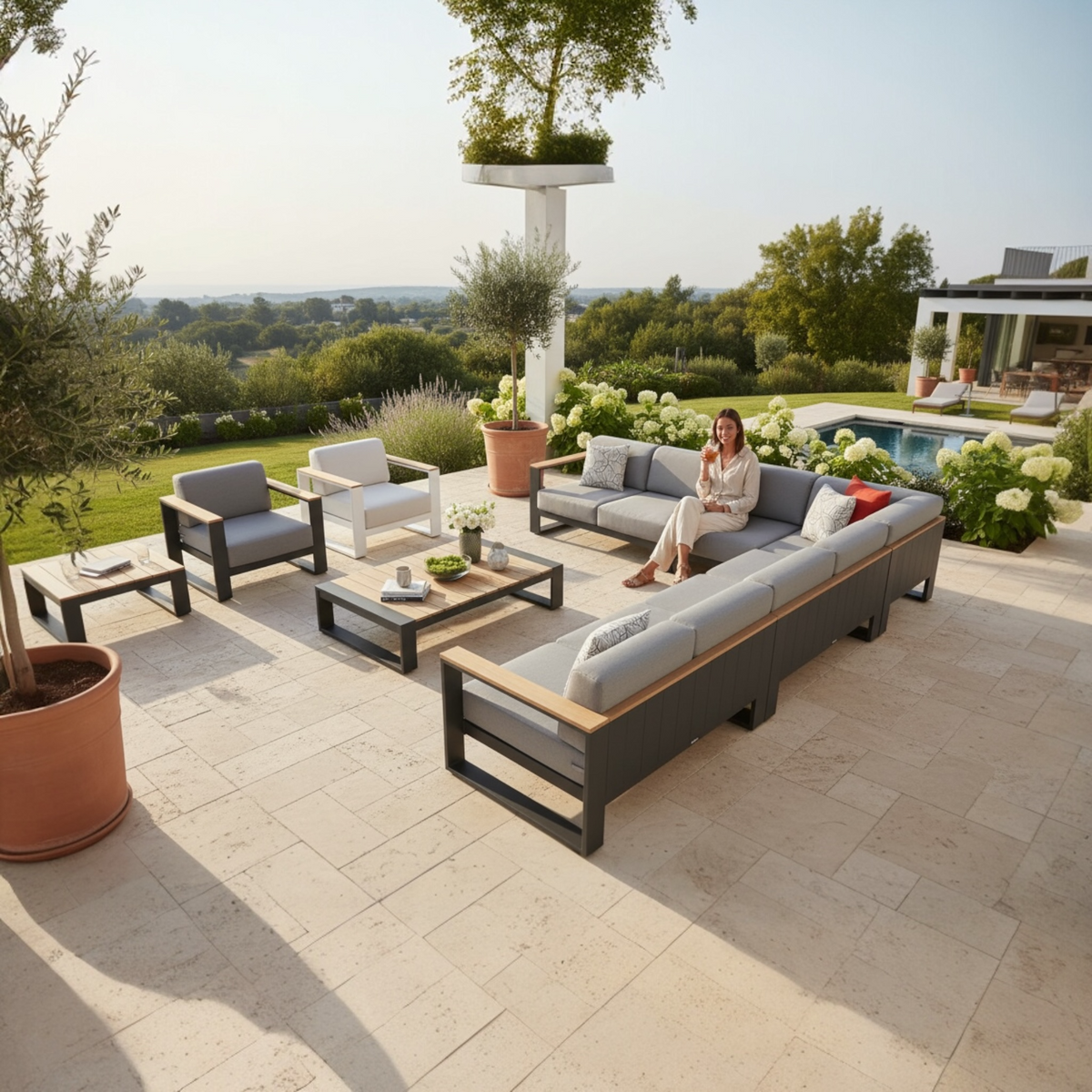 Sofy Plus 8-seat aluminum and teak outdoor sectional – shown outdoors