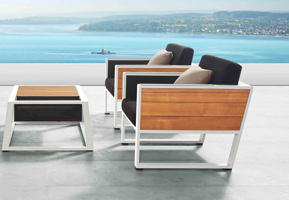 Armchair from the York Mini loveseat patio set with ice bucket table and anthracite cushions – shown outdoors