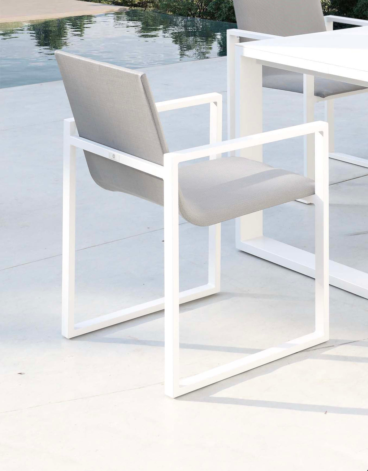 Armchair from the Como aluminum ceramic-top outdoor dining set – another view