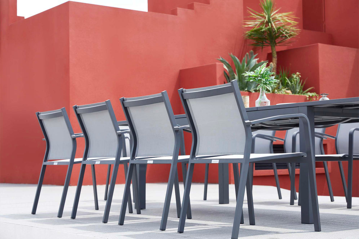 Nory black stackable aluminum patio chairs, set of 6 – shown outdoors (5)