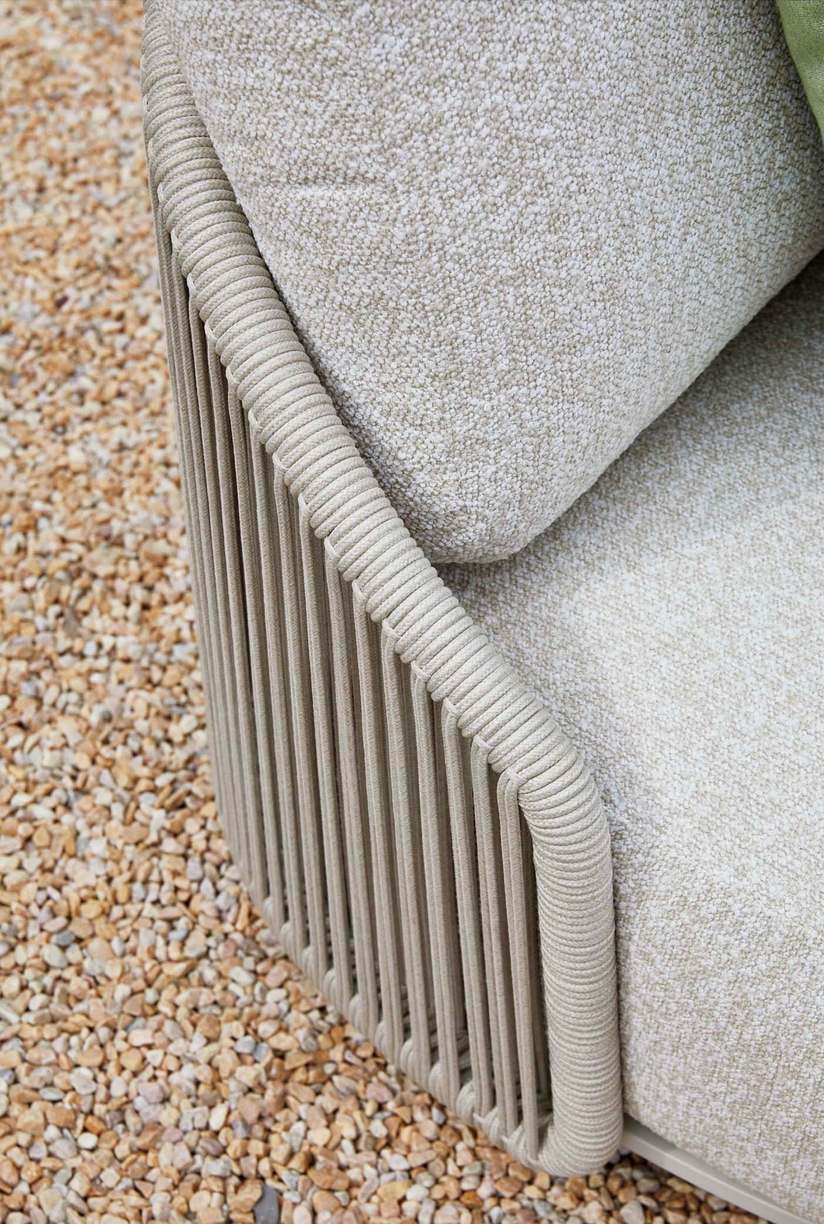 Armchair from the Aura beige rope outdoor lounge set with free-form ceramic coffee table – close-up detail