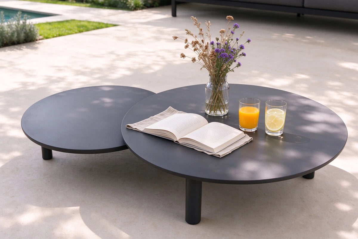 Flora anthracite aluminum loveseat set upholstered in black boucle – shown outdoors (5)