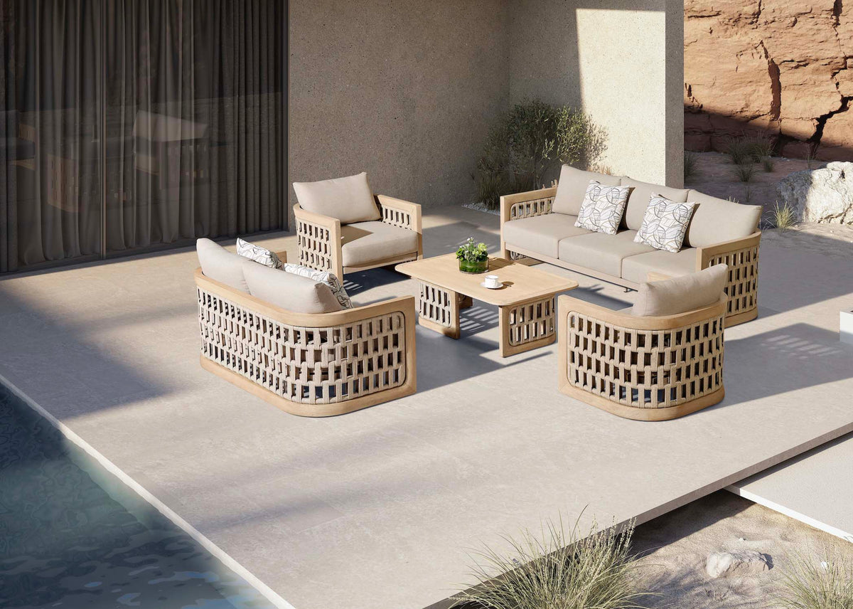 Palma XL 7-seat teak and rope patio set with teak coffee table – shown outdoors (4)