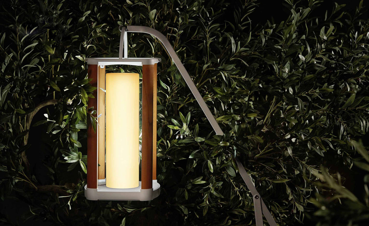 Aurora white solar outdoor lantern, medium – shown lit outdoors