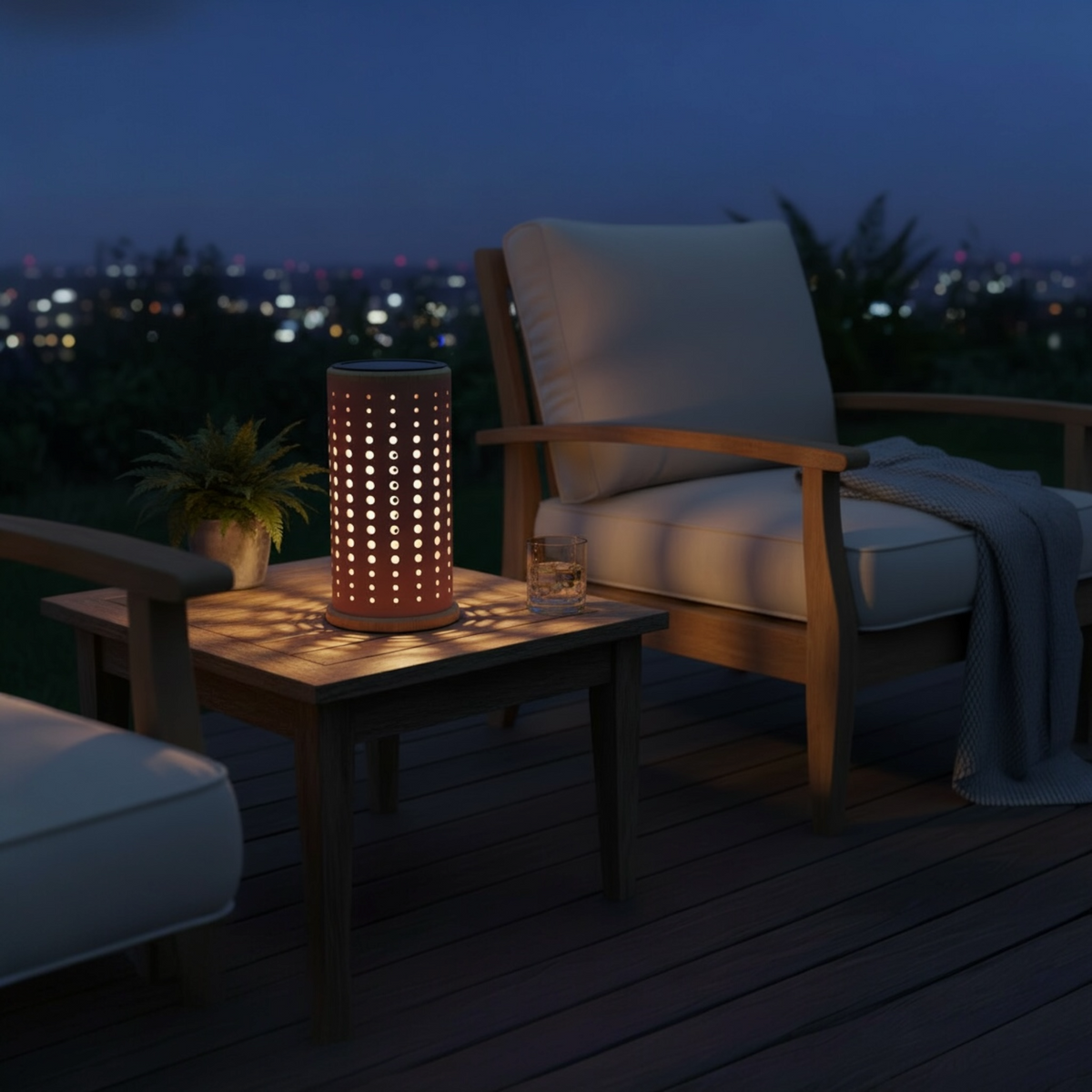 Arlo red aluminum solar lamp – shown lit outdoors (2)