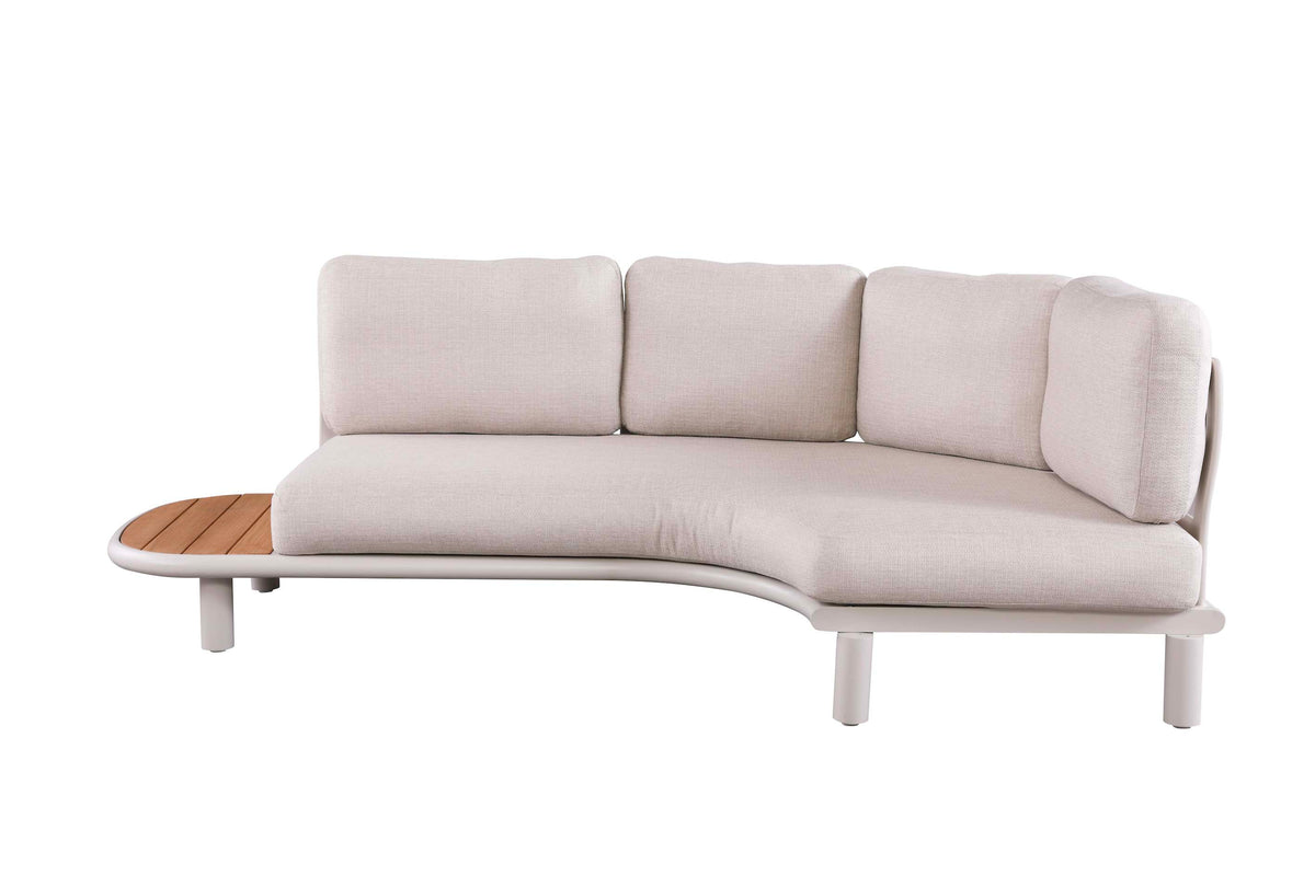 Chaise from the Sanka Cosy curved beige aluminum corner sofa with integrated teak platform – another view