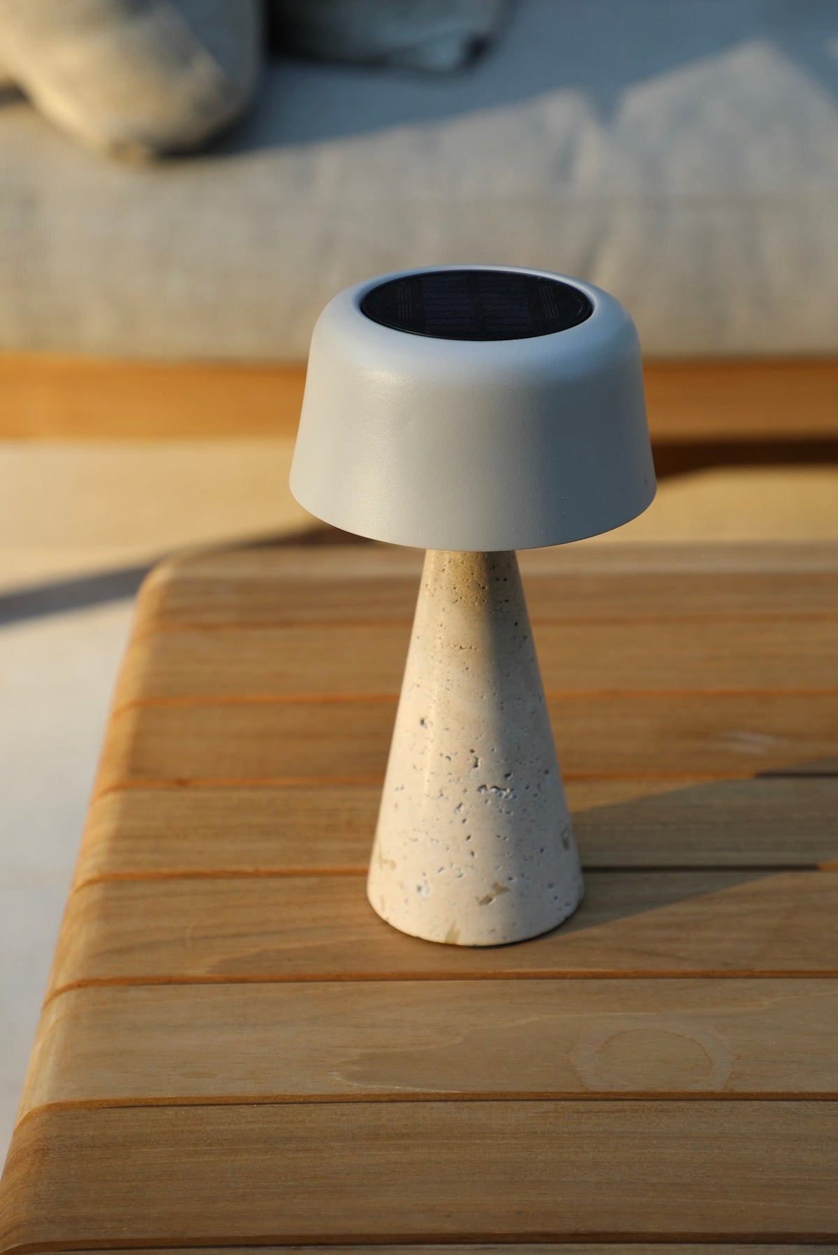 Moon travertine solar outdoor lamp, small – shown outdoors (3)