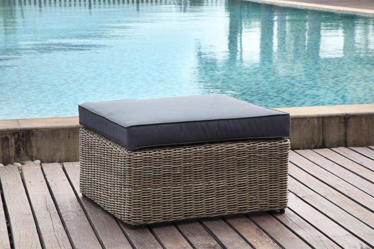 Ottoman from the Liberty Smart 6-seat modular resin wicker sectional – shown outdoors