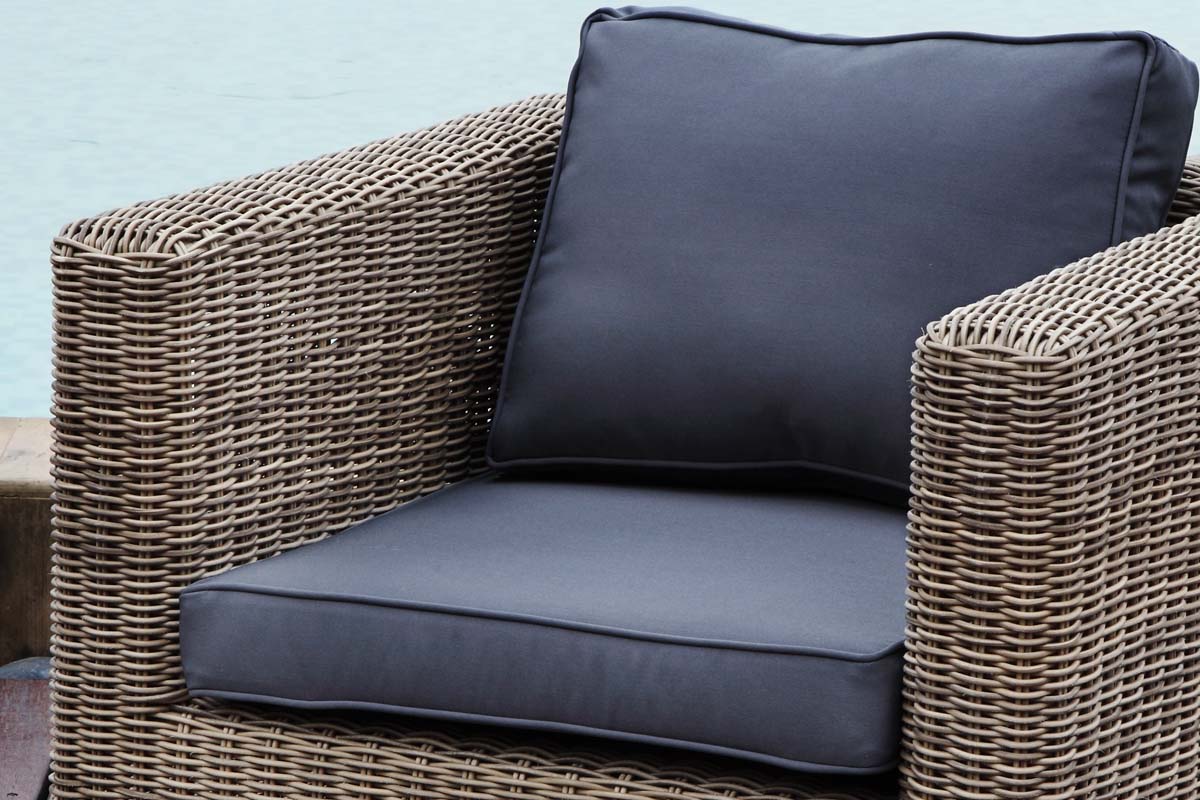 Liberty Cool modular resin wicker sectional with pouf and glass table – close-up detail