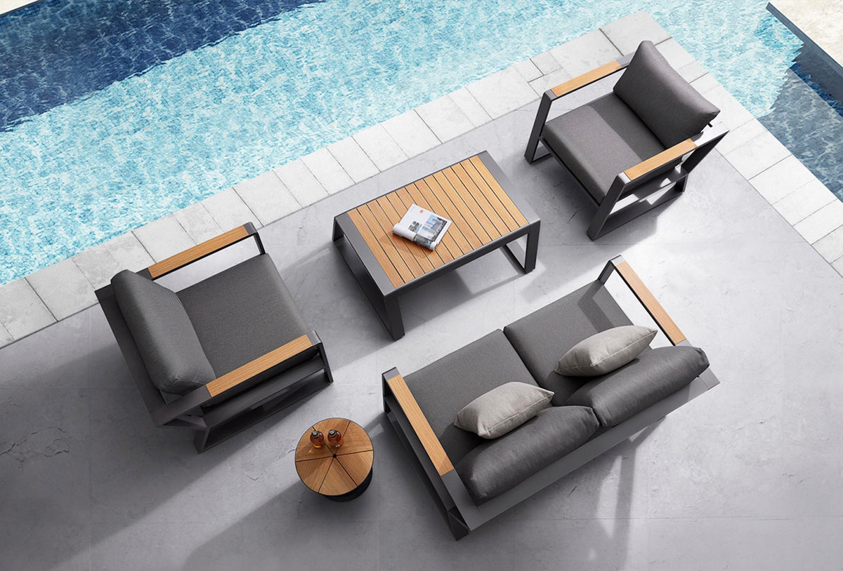 Exy Mini anthracite aluminum and teak loveseat set with slatted teak armrests – shown outdoors (3)