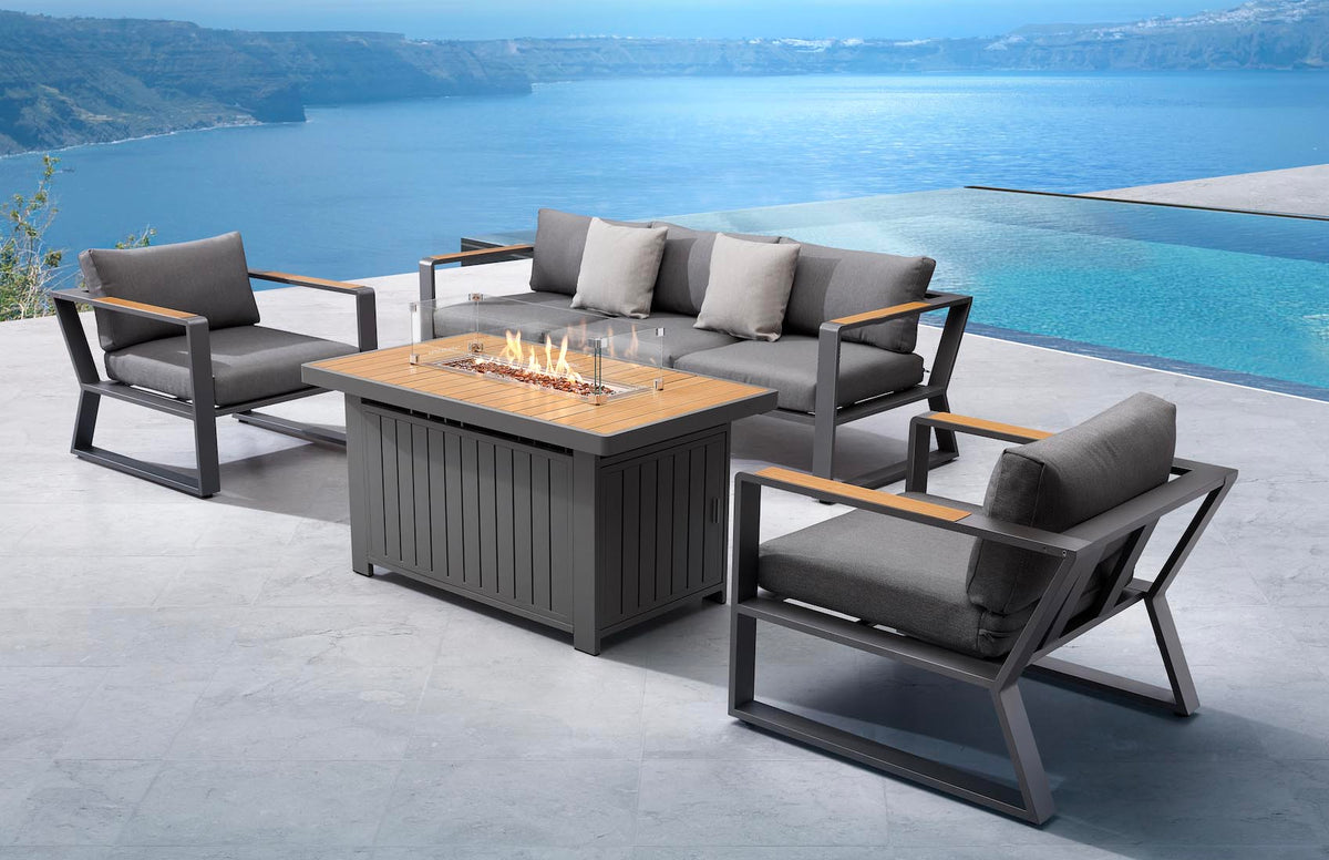 Exy anthracite aluminum and teak 5-seat patio set with teak coffee table – shown outdoors (5)