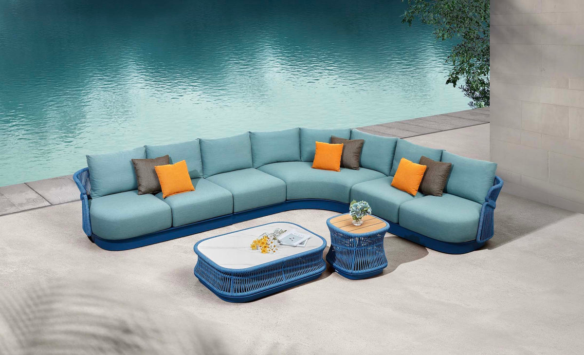 Laska curved blue rope outdoor corner sofa set with ceramic coffee table – shown outdoors (4)