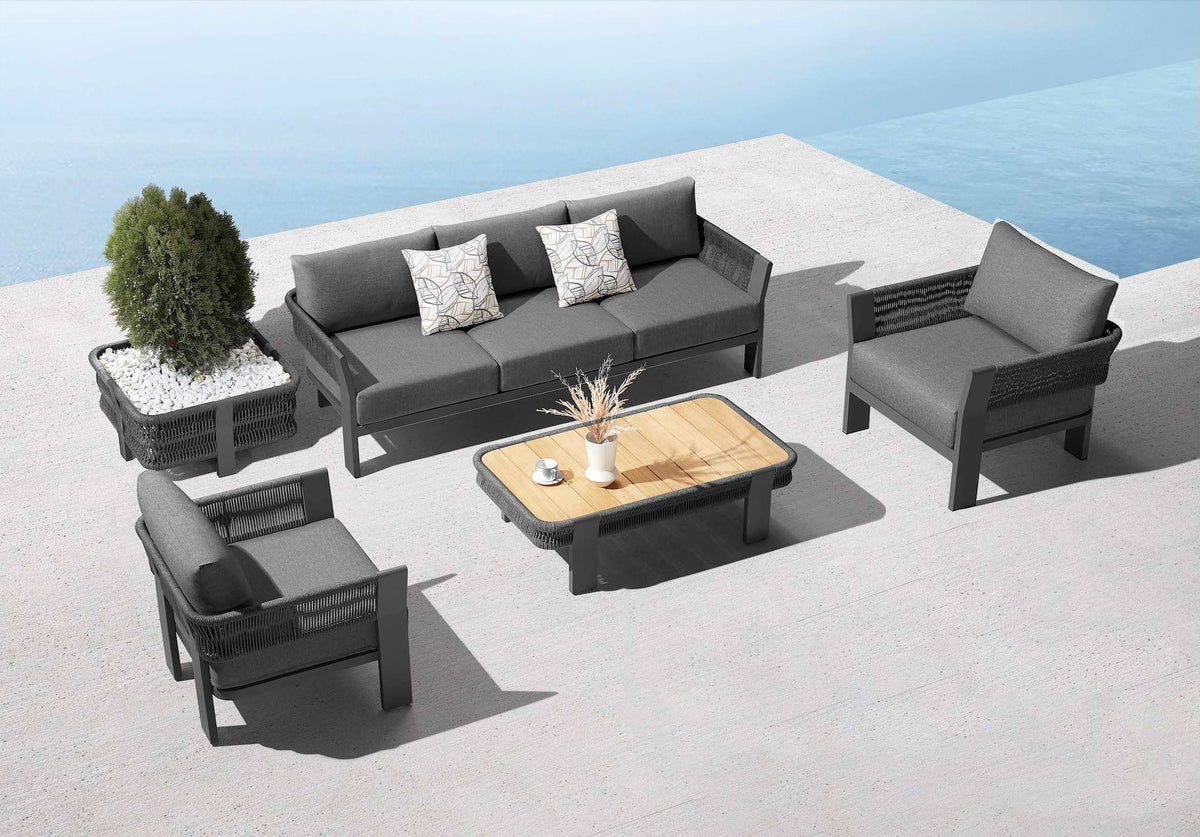 Olby black rope patio sofa set with teak-top coffee table – shown outdoors (4)