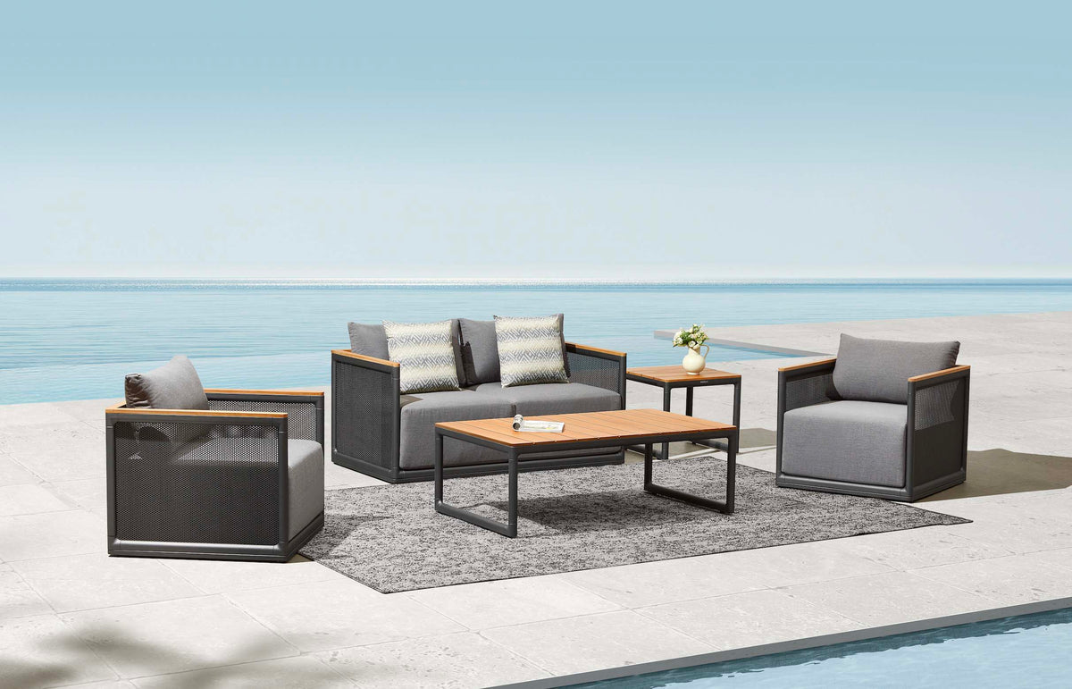 Rio 4-seat aluminum and teak lounge set with open-weave backs – shown outdoors (4)