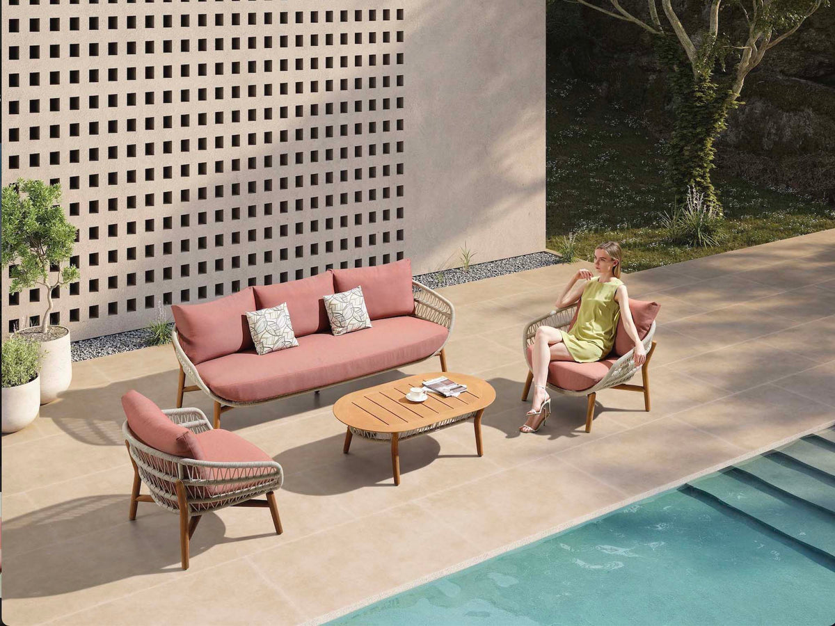 Rose teak and rope patio set with powder pink cushions – shown outdoors (3)