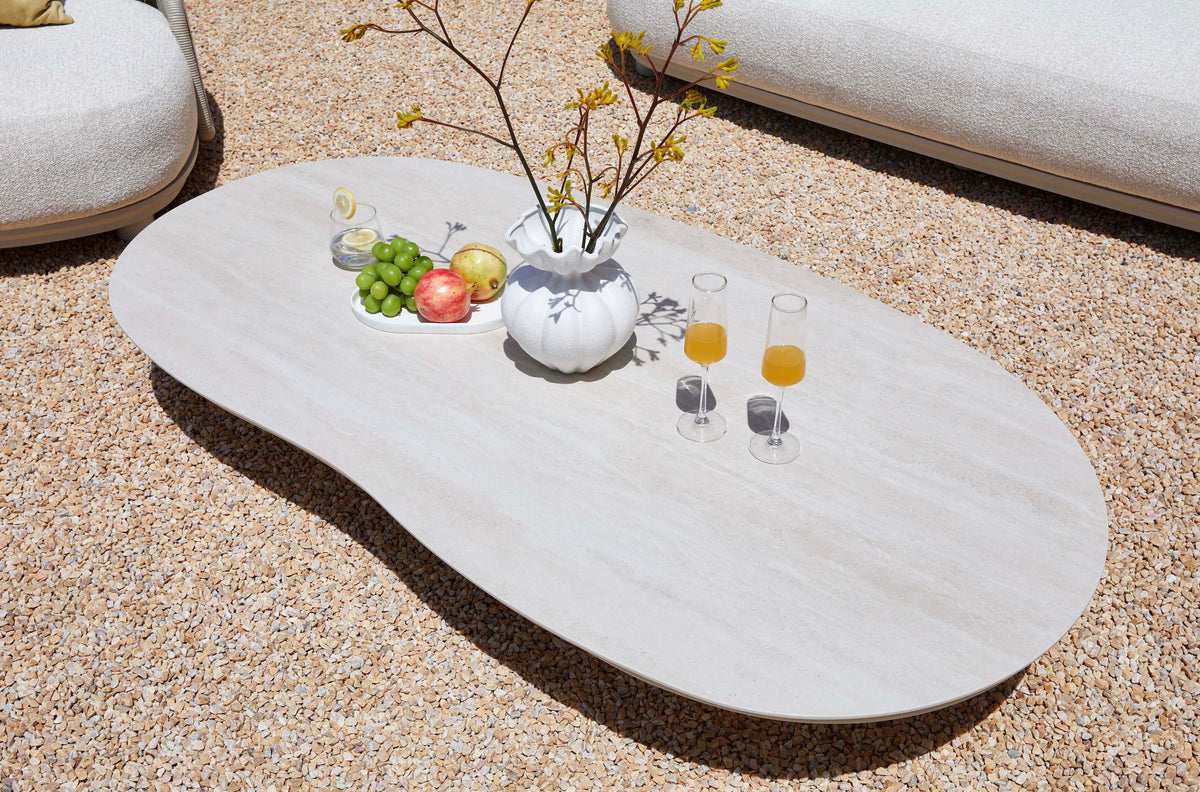 Aura beige rope outdoor lounge set with free-form ceramic coffee table – shown outdoors (6)