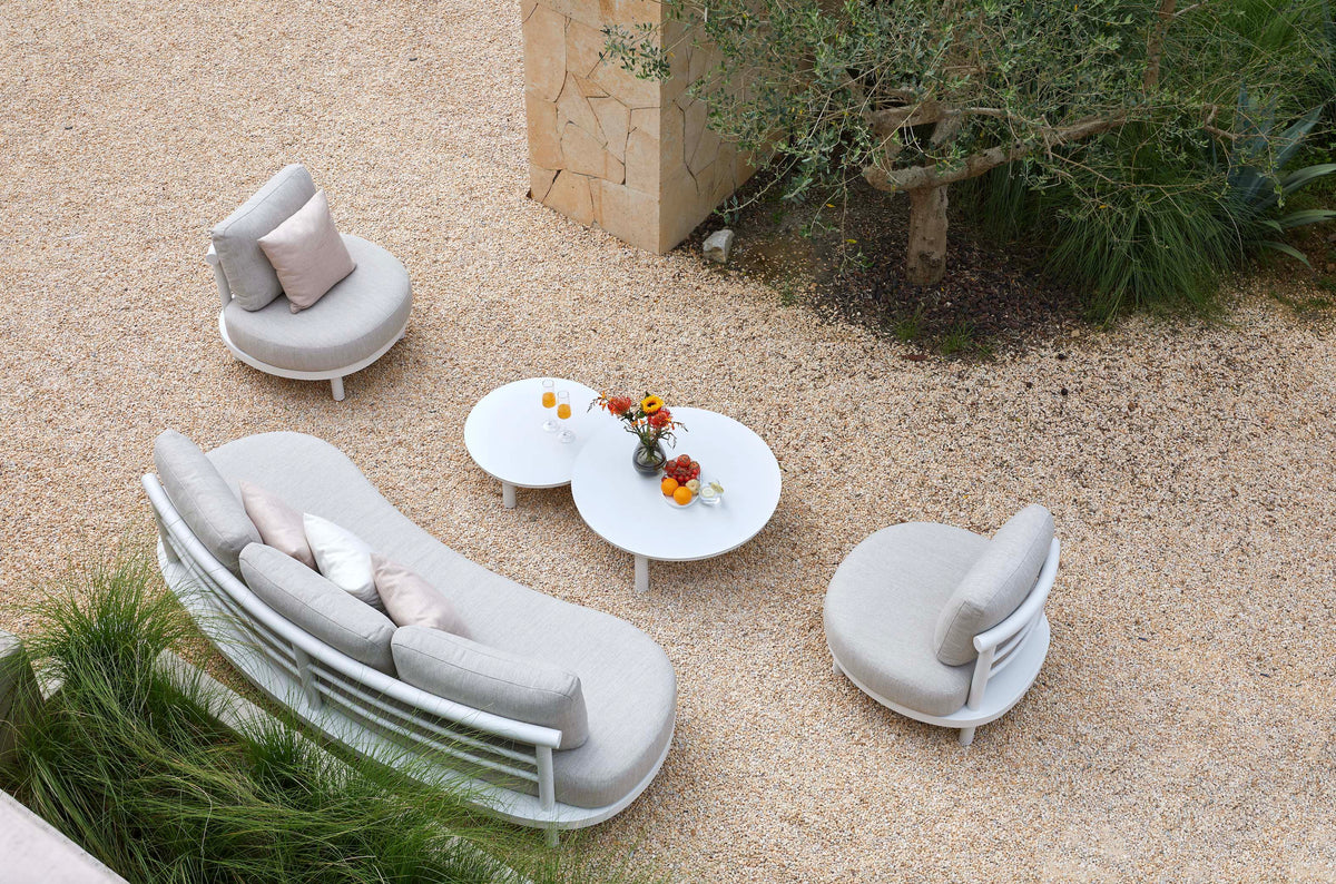 Ambre white aluminum sofa set with light gray cushions – shown outdoors (4)