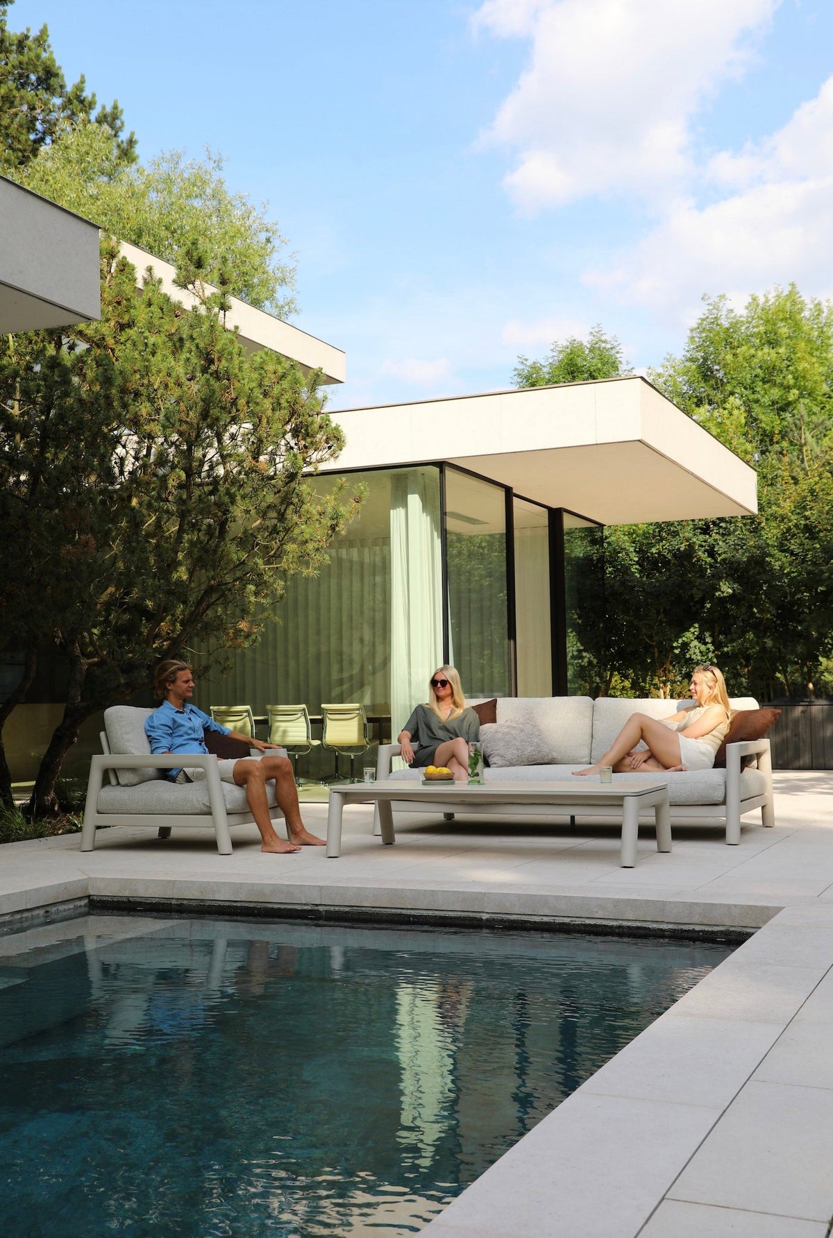 Matia convertible aluminum and rope outdoor sofa set in neutral tones – shown outdoors (2)