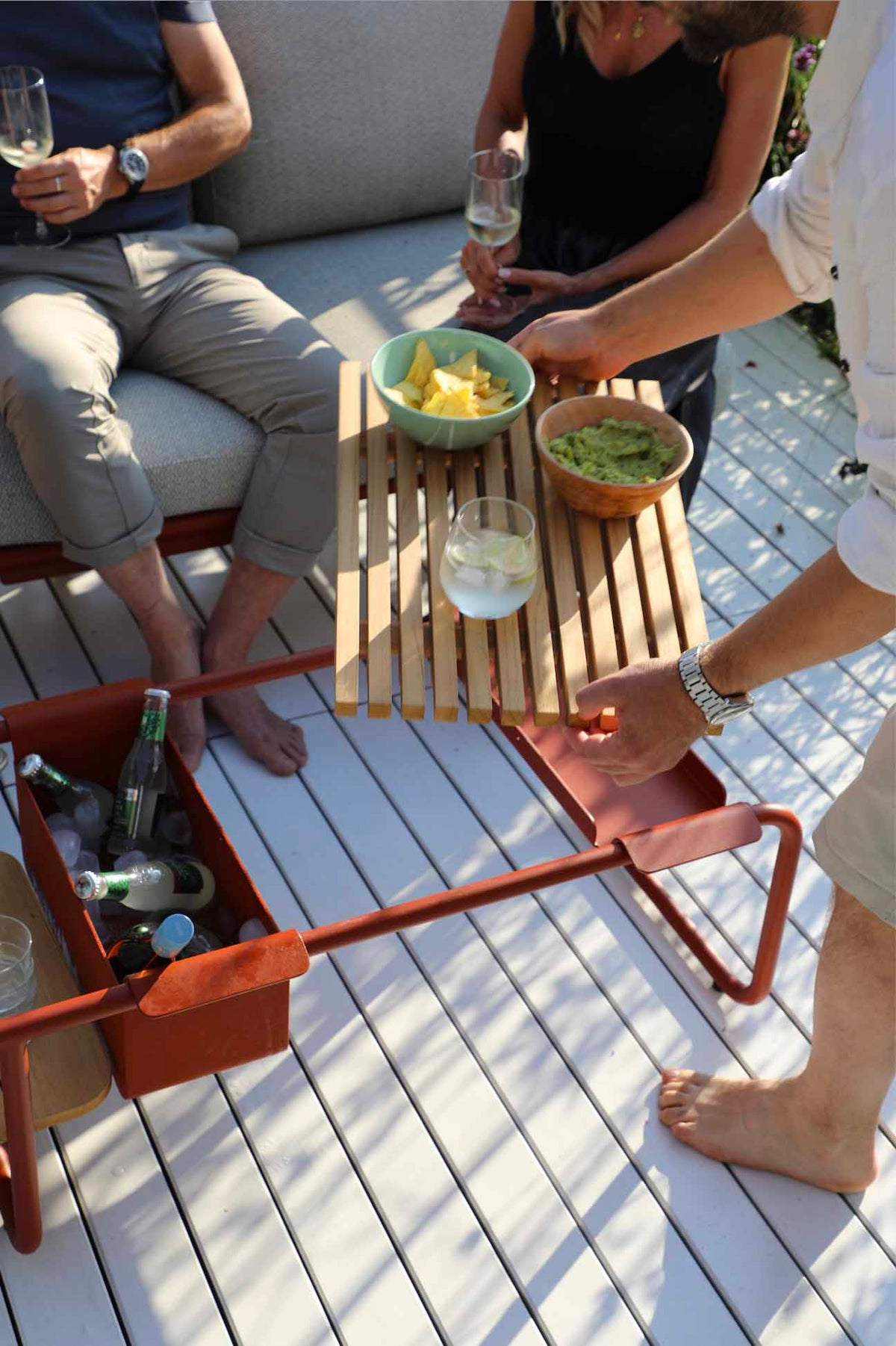 Sunny terracotta convertible aluminum outdoor sofa lounger – shown in use