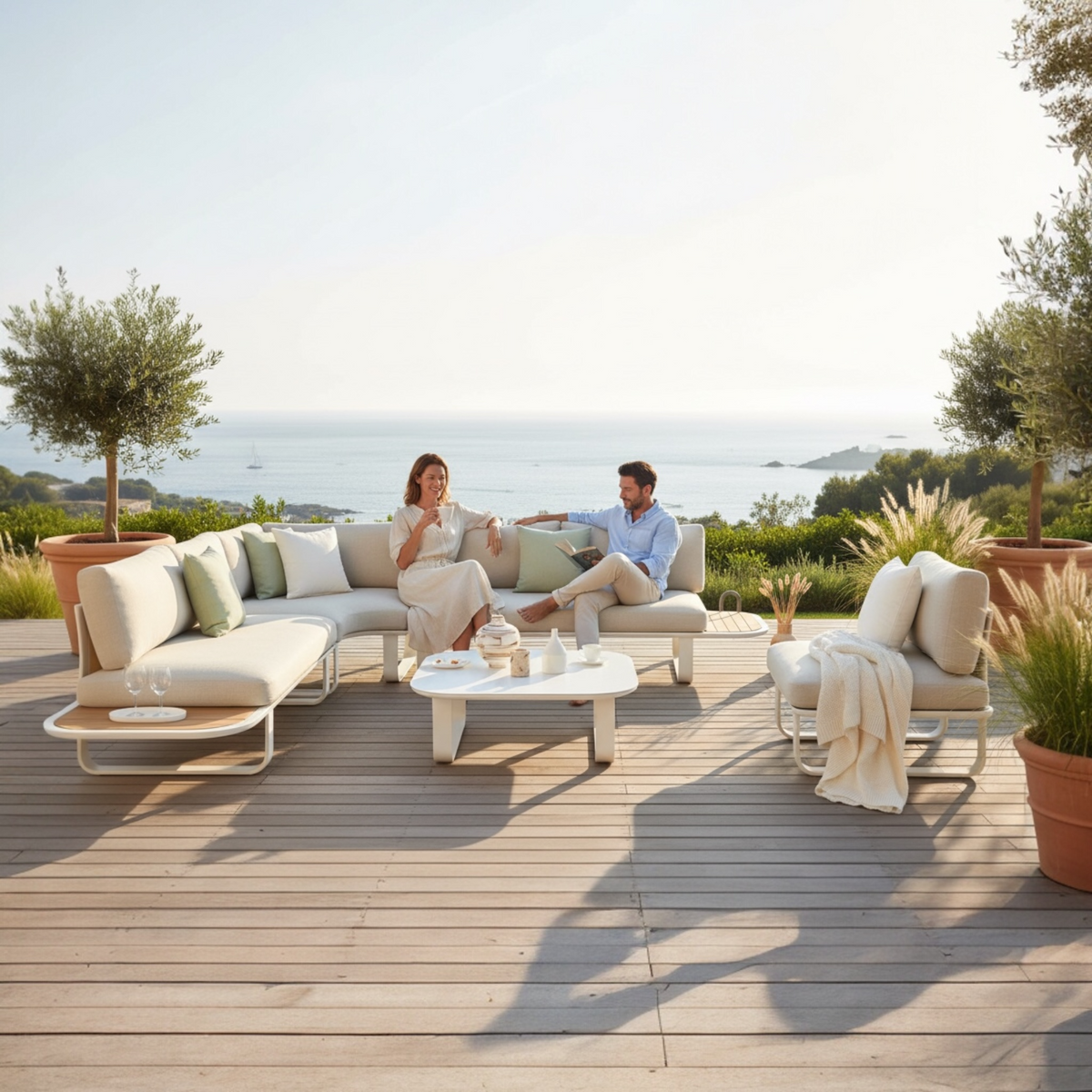 Emy 6-seat aluminum outdoor sectional with light teak details – shown outdoors