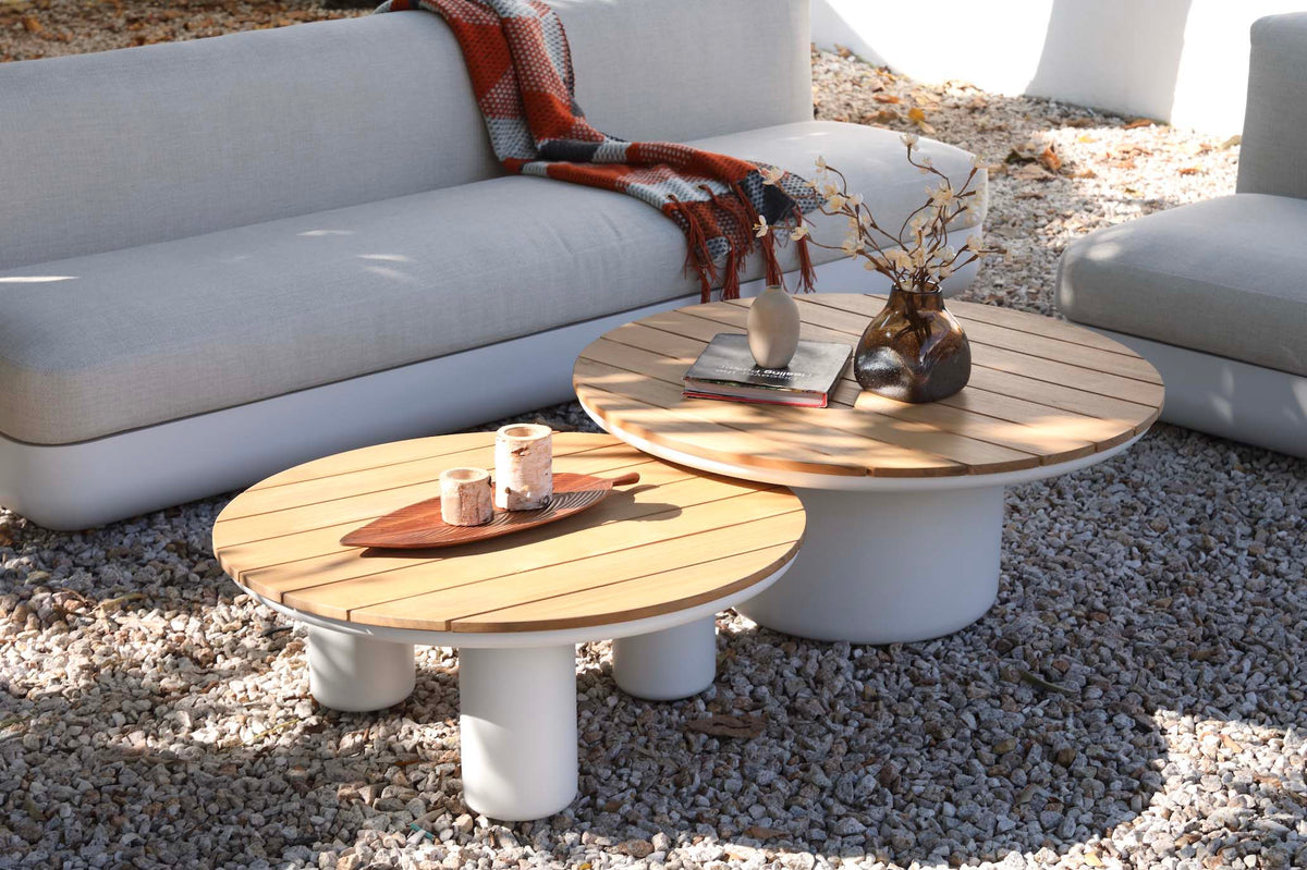 Mae curved white aluminum patio set with teak-top coffee table – shown outdoors (3)