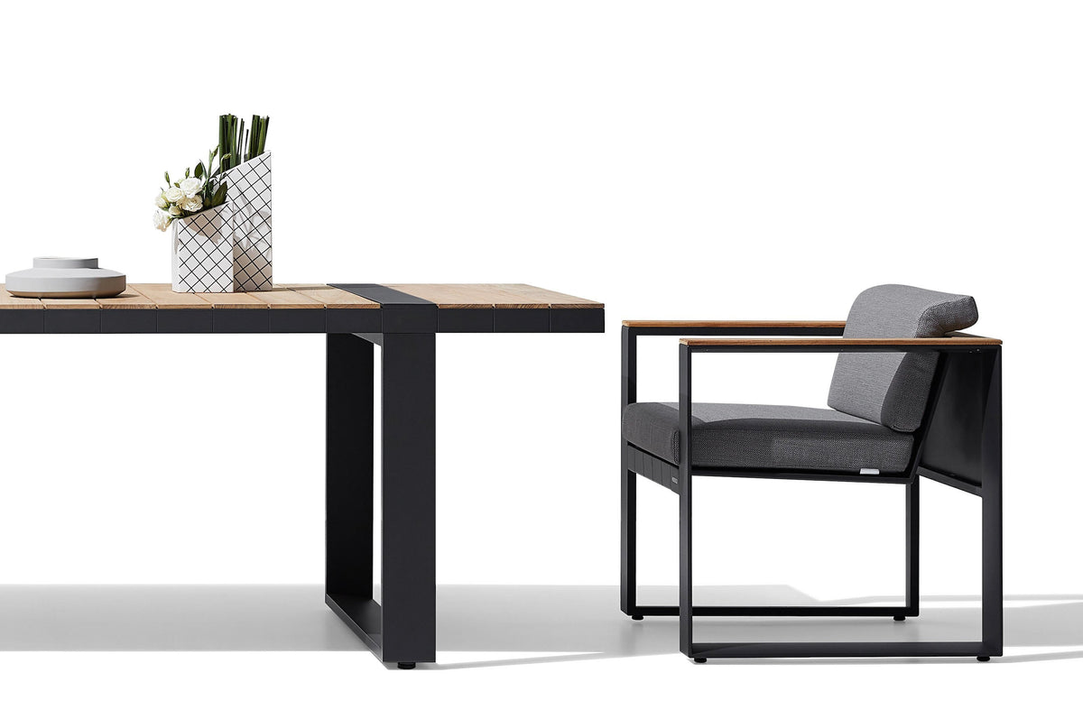 Armchair from the Sofy 6-seat slim aluminum and teak dining set – another view