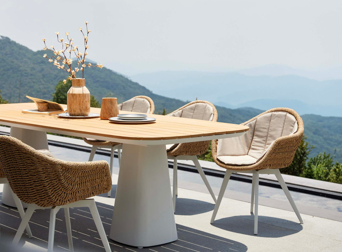Milo teak-top aluminum outdoor dining table for eight – shown outdoors (5)