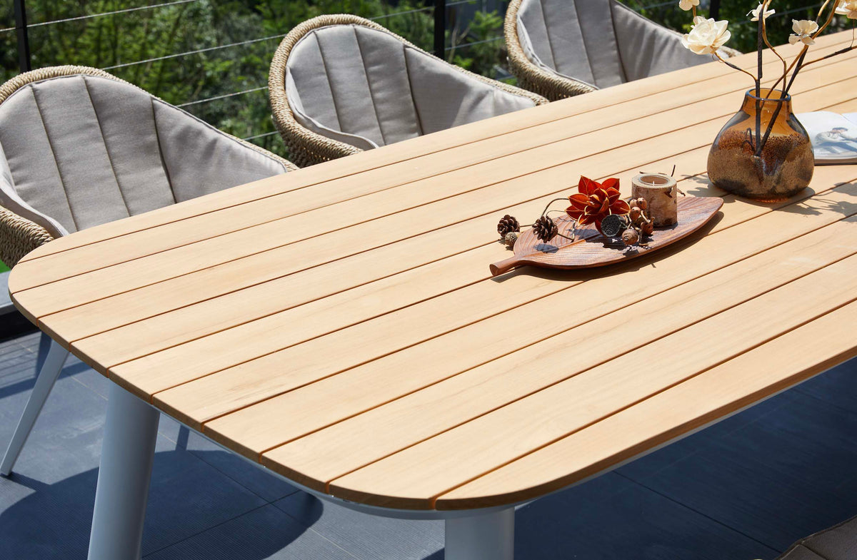 Lara rounded-corner teak and white aluminum outdoor dining table – close-up detail
