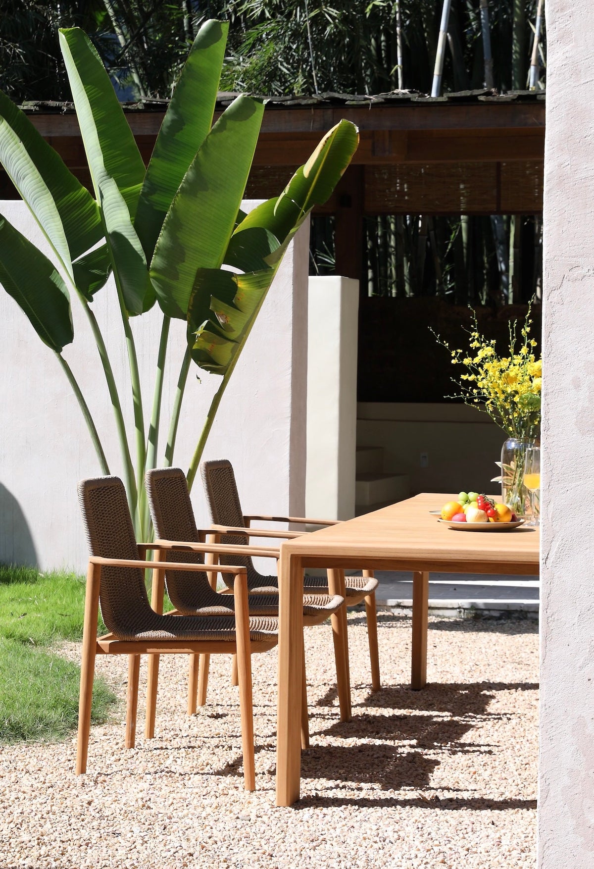 Paula solid teak slatted outdoor dining table for eight – shown outdoors (6)