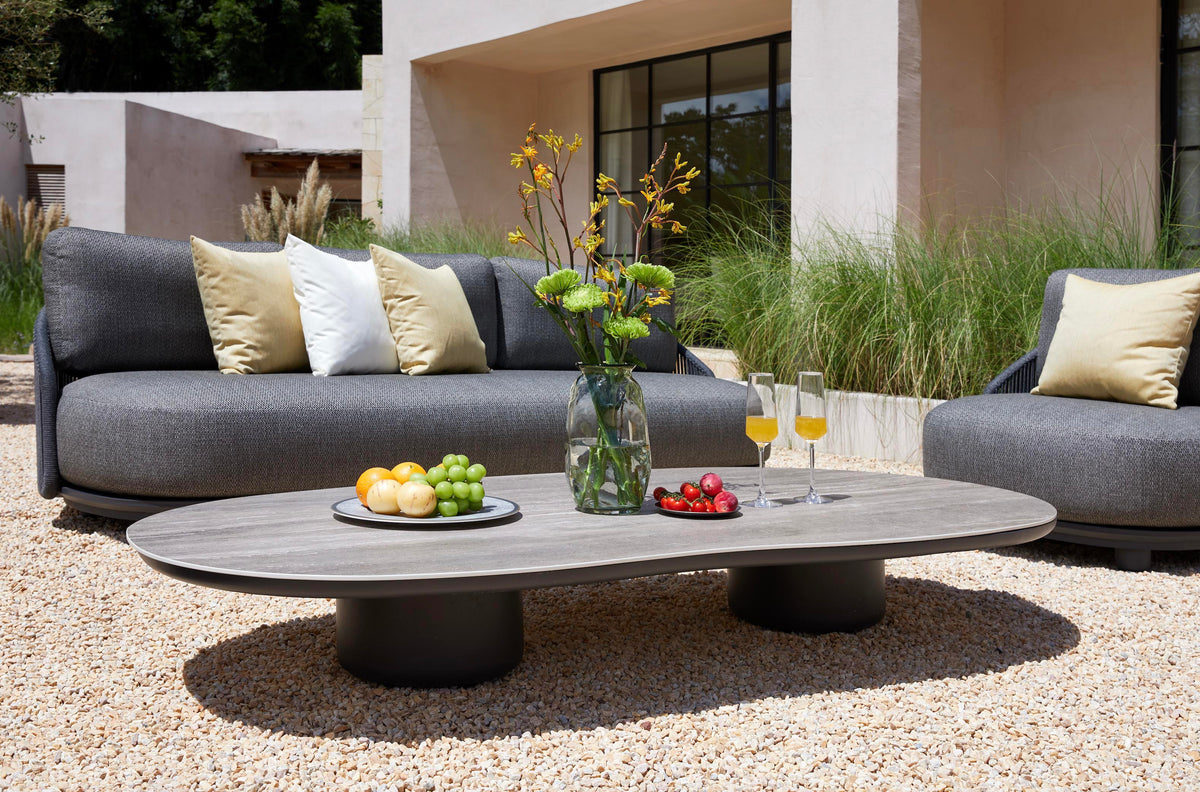 Aura black rope outdoor lounge set with gray-taupe marble-effect coffee table – shown outdoors (6)