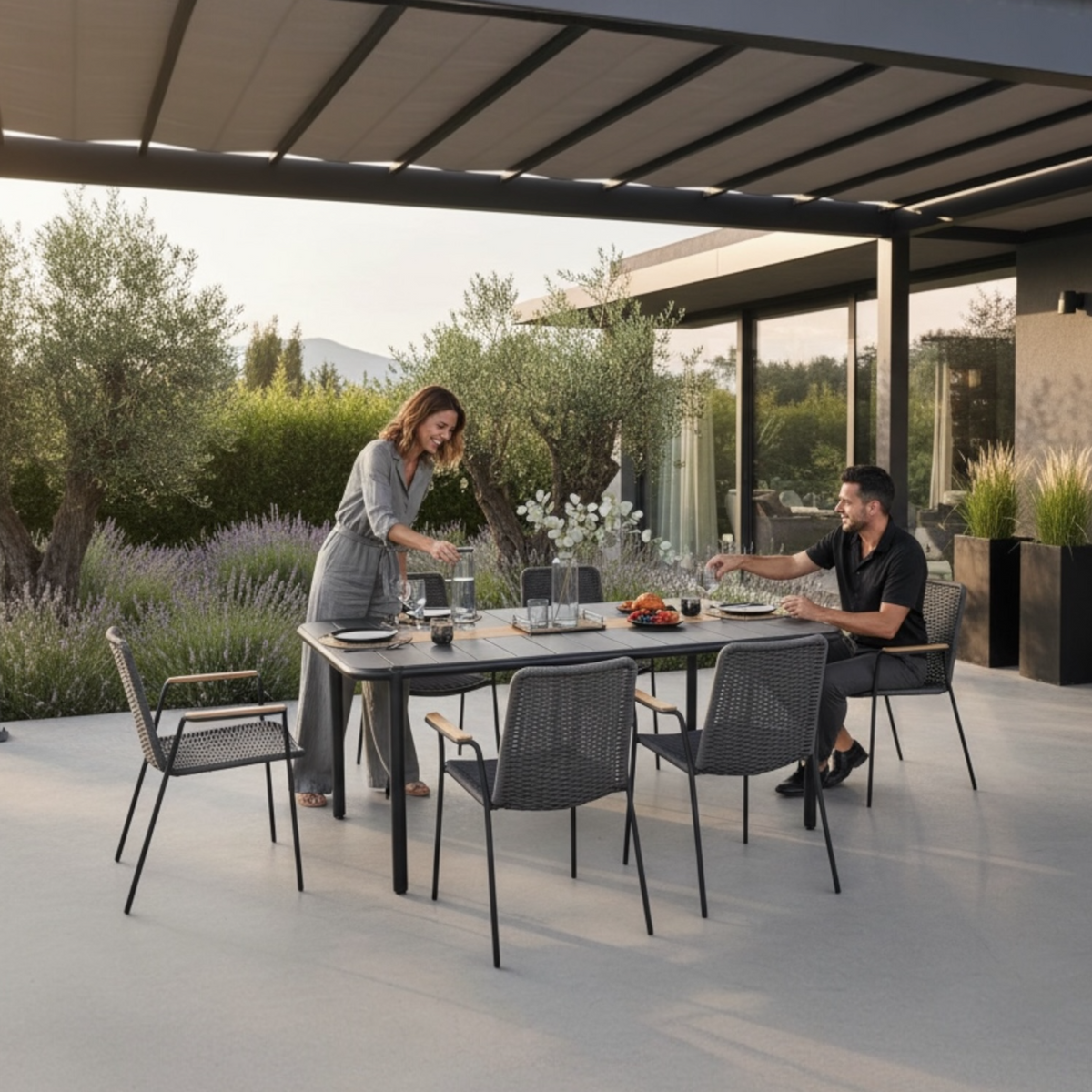 Sarran black aluminum restaurant table for six, 175 cm – shown outdoors