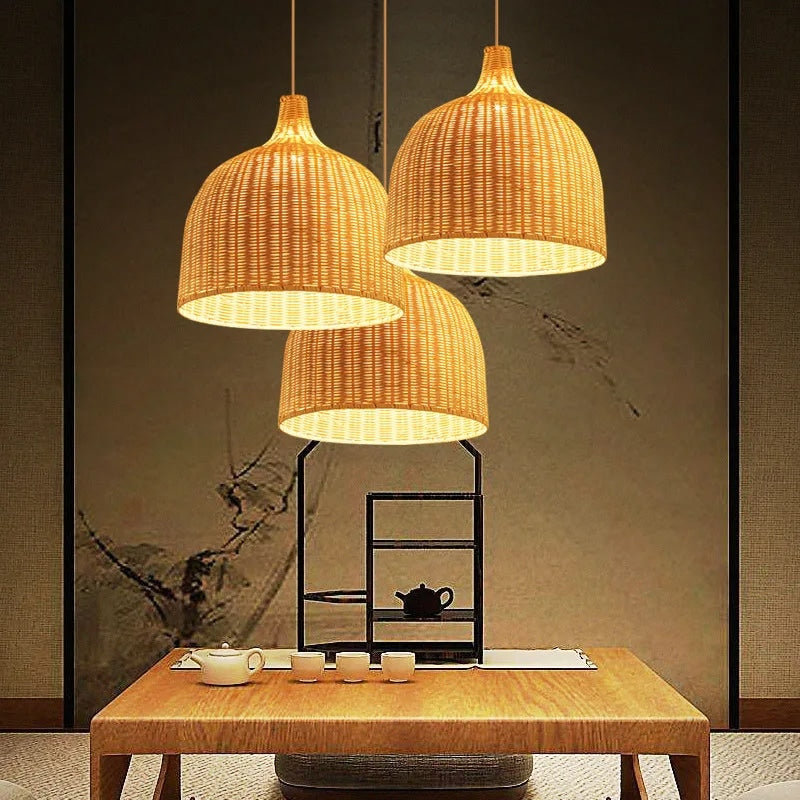 Faceted Chinese lantern-style wicker-look lamp shade – shown lit in a room setting