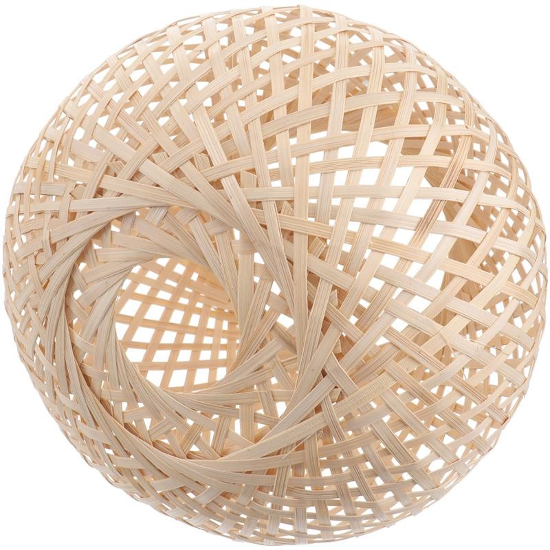 Rounded handmade rattan lamp shade with an airy mesh – close-up detail