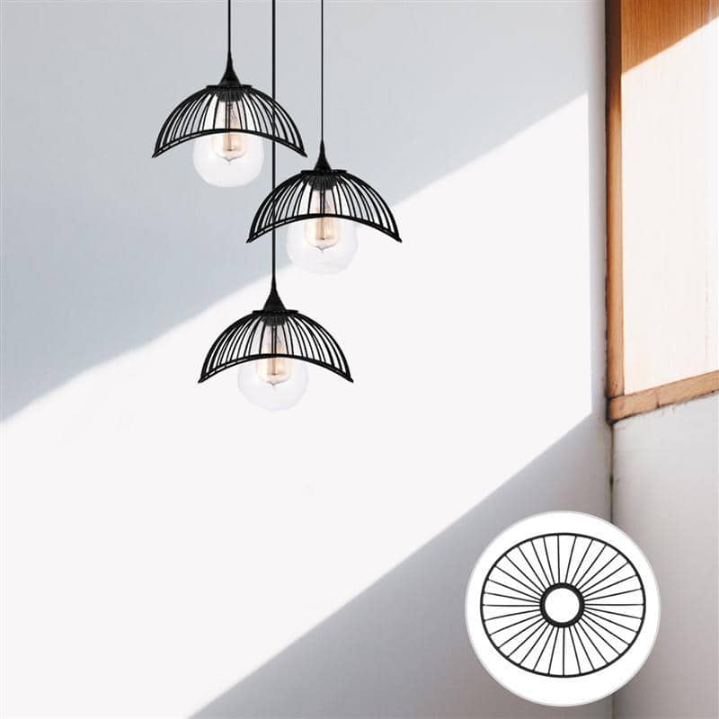 Handwoven rattan lamp shade shaped like a lotus leaf – shown in a room setting (2)